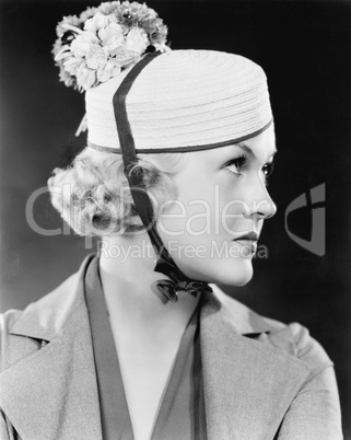 Portrait of a woman with a pillbox hat