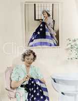Woman sitting under the portrait of Betsy Ross sewing the American flag
