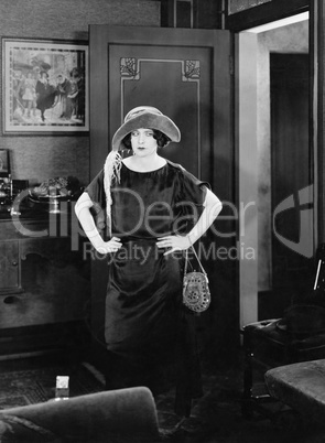 Woman entering into a room looking stern