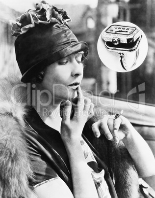 Woman looking at a watch ring