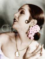 Portrait of a young woman wearing flowers in her hair