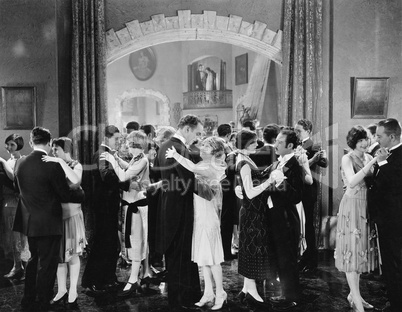 Group of people dancing in a ballroom