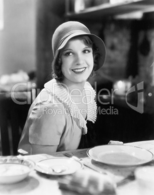 Woman with hat looking charming