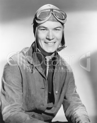 Portrait of a young man with a cap and goggles