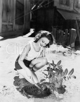 Young woman doing garden work