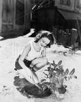 Young woman doing garden work