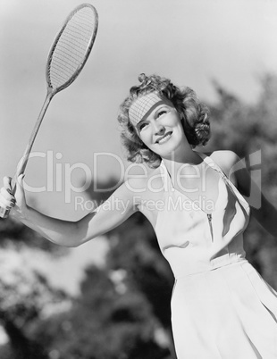 Young woman with a badminton racket