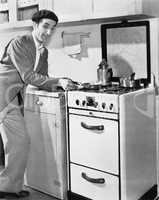 Man in a kitchen preparing food
