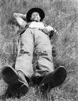 Man relaxing in meadow