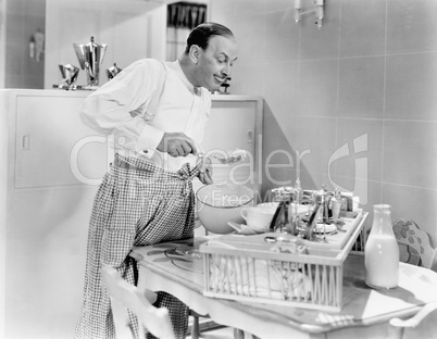 Man preparing food in a kitchen