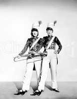 Two women toy soldiers ready for marching orders