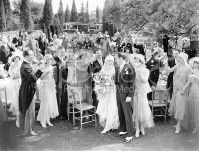 Wedding party toasting to the bride and groom