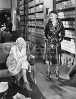 Two women at a shoe store