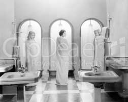 Three women in a bathroom together