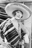 Woman in a Mexican hat and costume