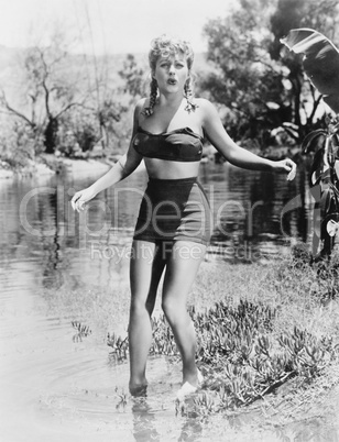 Woman trying out the cold water