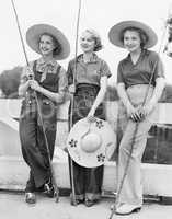 Three Women going fishing with huge hats