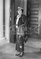 Portrait of elegant woman with fur coat