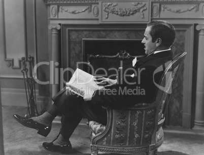 Reading by the fireplace