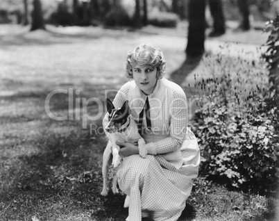 Woman posing with herJack Russell terrier