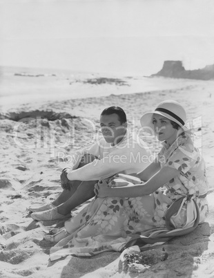 Couple relaxes at the beach