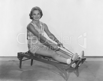 Working out with rowing machine