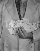 Man holding deck of cards