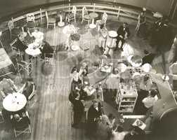 High angle view of people at cocktail lounge aboard ship