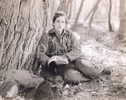 Man reading in the woods Man reading in the woods