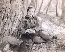 Man reading in the woods