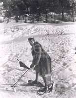 Man playing golf in the snow