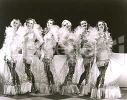 Women dressed in cellophane costumes