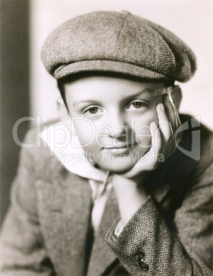 Portrait of child in newsboy cap