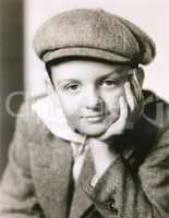 Portrait of child in newsboy cap