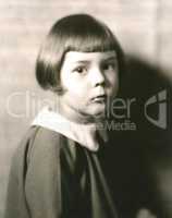 Portrait of cute little girl with bobbed hair
