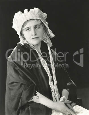 Portrait of woman in bonnet