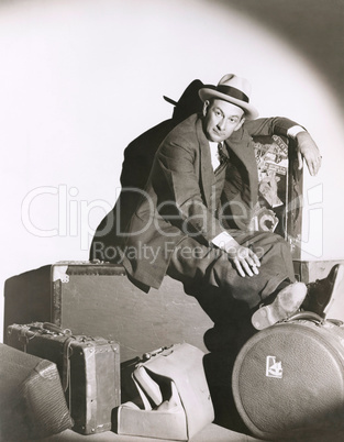 Man with a lot of luggage