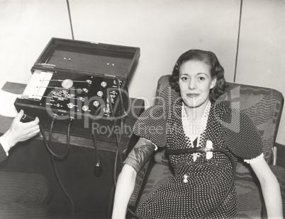 Woman taking a polygraph test