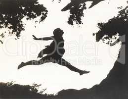 Silhouette of a woman in mid-air jumping between two trees