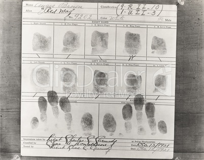 Close-up of person's fingerprints taken at police headquarters