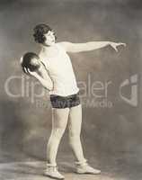 Woman working out with medicine ball