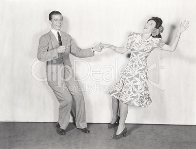 Couple dancing the jitterbug