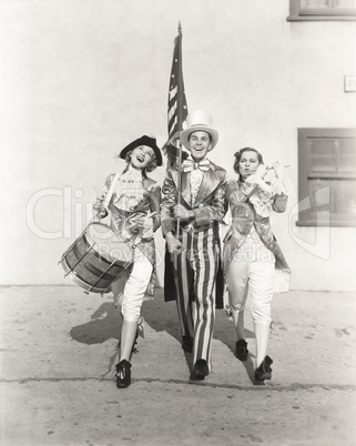 People in 18th century costumes celebrating independence day