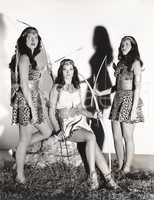 Three women dressed in Amazon costumes