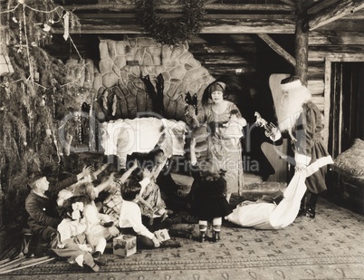 Children receiving Christmas presents from Santa Claus