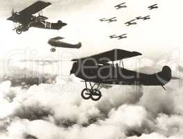 German biplanes flying above the clouds