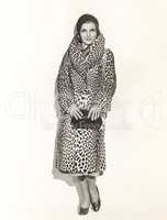 Portrait of woman wearing a leopard print coat
