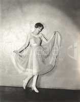 Woman modeling pleated dress