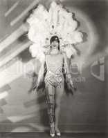 Showgirl in feather headdress