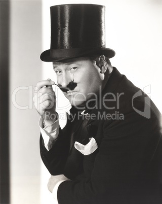 Man in top hat with waxed mustache